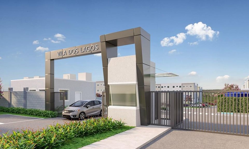 Perspectiva ilustrativa da entrada do Vila dos Lagos, com pórtico com o nome do condomínio, guarita, portão de grades e um carro na portaria